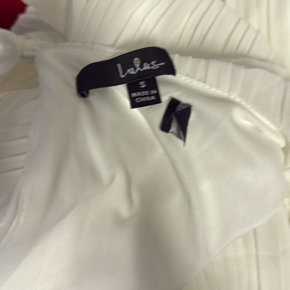 Embrace Your Beauty Ivory Pleated Long Sleeve Skort Romper - Picture 9 of 9